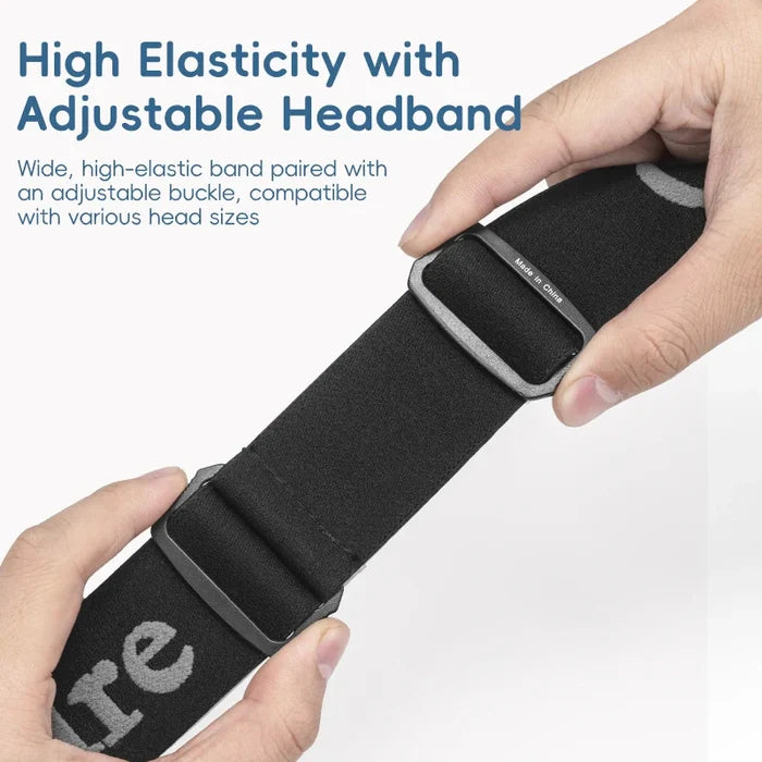 Black headband with adjustable buckle held by hands on a light gray background
