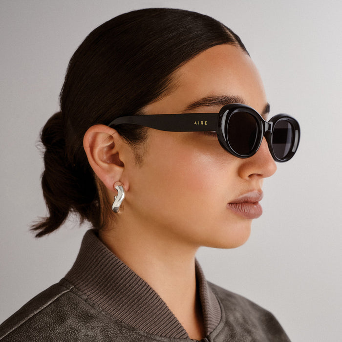 Epsilon Black Female Oval Sunglasses | Aire