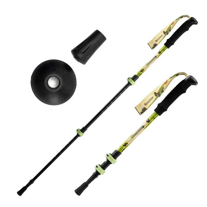 Two hiking poles with camouflage grips and black ferrules on a white background#color_yellow