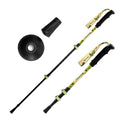Two hiking poles with camouflage grips and black ferrules on a white background#color_yellow