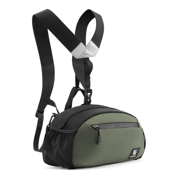 Green and black crossbody bag with adjustable straps on a white background#Color_green