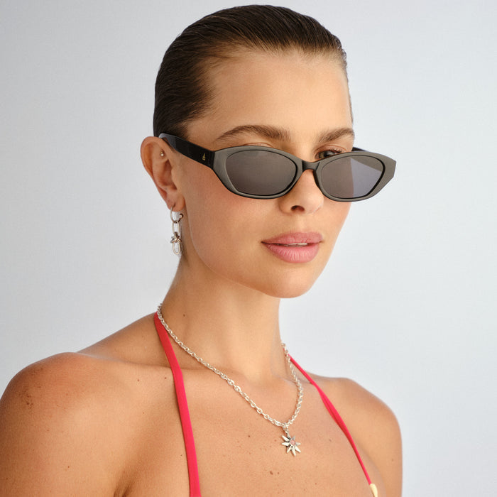 Moonstone Black Female Oval Sunglasses | Aire
