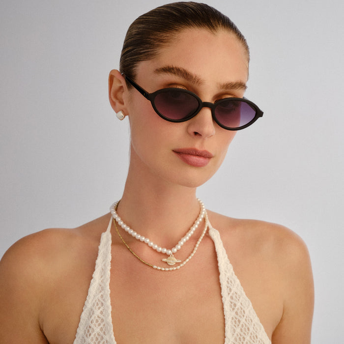 Pyxis Black Female Oval Sunglasses | Aire