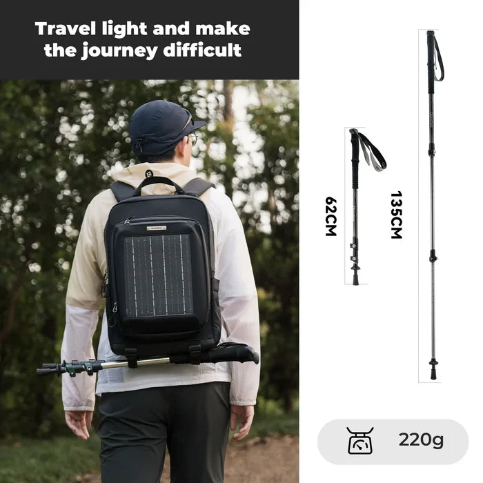 Person wearing a black backpack with solar panel, hiking pole, and measurement details on a white background.#color_black