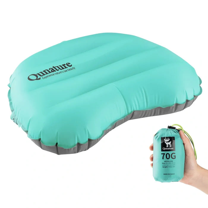 Turquoise inflatable pillow with Qnature branding and a smaller pack of the same brand.#color_Blue